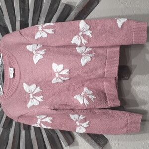 Honey Punch Mauve Sweater with White Bow Design